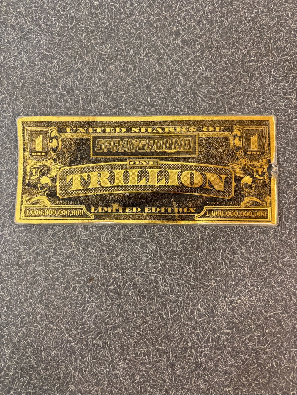Sprayground Gold Trillion Novelty Wall Plaque